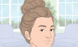 Une jeune femme arbore un chignon flou, parfait pour un look décontracté. Apprenez comment faire un chignon flou facilement.