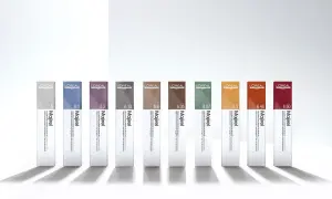 Dix tubes de coloration Majirel L'Oréal, aux teintes variées, prêts pour un temps de pause parfait.