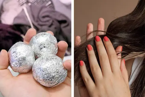 Astuce pour enlever électricité statique cheveux : boules d'aluminium dans la sécheuse. Mains avec vernis corail caressant des cheveux bruns.