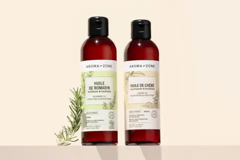 Deux flacons Aroma-Zone : Huile de Romarin et Huile de Chébé, pour comment fortifier ses cheveux.