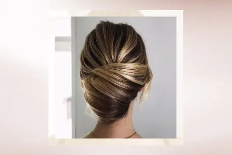 Chic chignon torsadé, une idée de coiffure pour la rentrée parfaite pour un look élégant et sophistiqué.