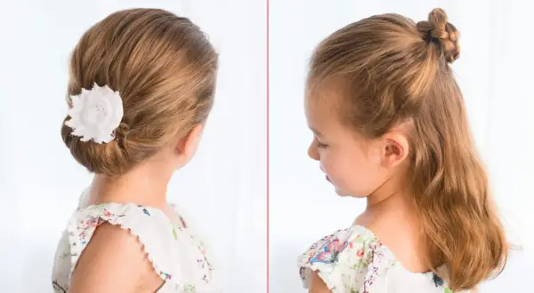 Coiffure élégante pour une tresse enfant fille : un chignon bas orné d'une fleur blanche et une demi-queue tressée.