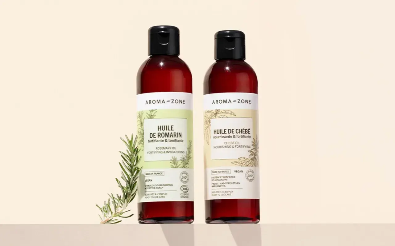 Deux flacons Aroma-Zone : Huile de Romarin et Huile de Chébé, pour comment fortifier ses cheveux.