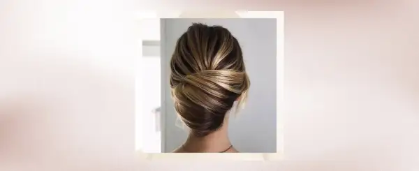 Chic chignon torsadé, une idée de coiffure pour la rentrée parfaite pour un look élégant et sophistiqué.